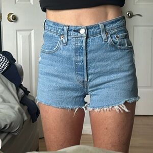 Levi’s high rise button fly cutoffs size 25.